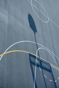 Shadows on the street basketball court