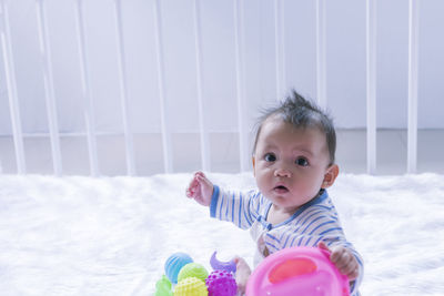 Portrait of cute boy looking away