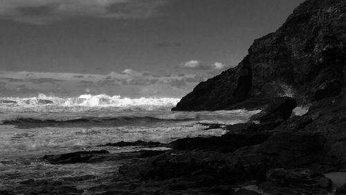 Scenic view of beach against sky