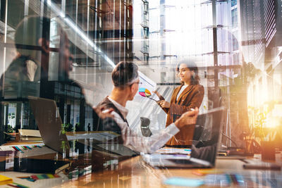 Portrait of man playing chess at airport