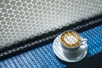 High angle view of cappuccino on table