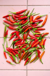 Directly above shot of red chili pepper on floor