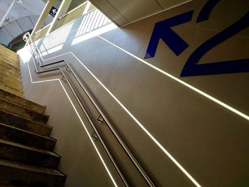 Low angle view of illuminated staircase in building