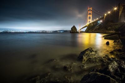 Illuminated golden gate bridge at night