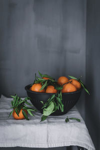 Close-up of orange fruits on table