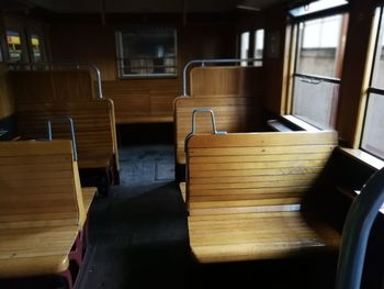 Empty wooden seats in a train