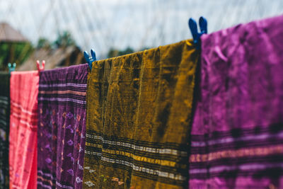 Close-up of clothes drying on clothesline