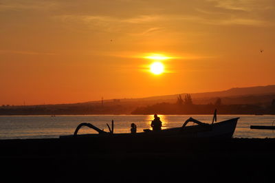 Scenic view of sea at sunset