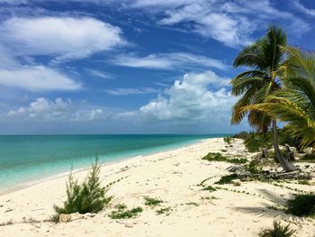 Scenic view of sea against cloudy sky