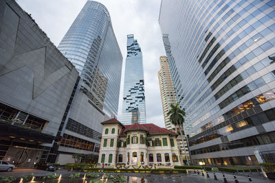 Low angle view of skyscrapers against sky