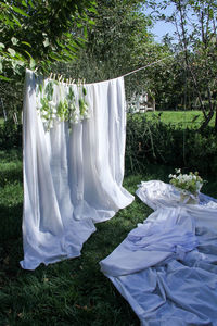 Low section of woman standing on field