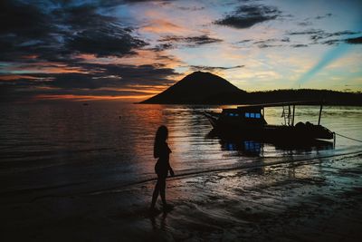 Scenic view of sea at sunset