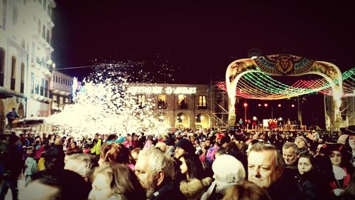 Crowd at music concert at night