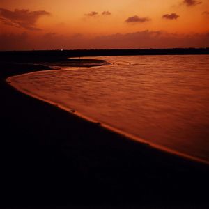 Scenic view of sea at sunset