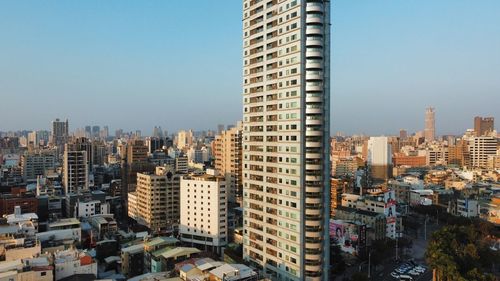 Cityscape against clear sky