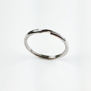 Close-up of ring over white background