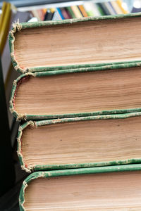 Close-up of books on wooden table