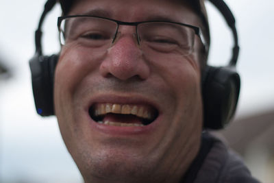 Close-up portrait of a man smiling