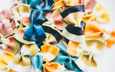 Directly above shot of multi colored pasta served in plate