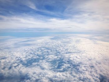 Aerial view of clouds over blue sky