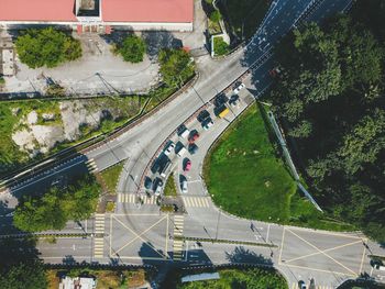 High angle view of street amidst trees in city