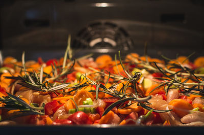 Close-up of fresh vegetables in oven
