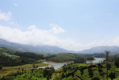 High angle view of mountain against cloudy sky