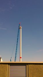 Low angle view of built structure against blue sky