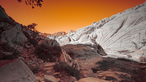 Scenic view of mountains against sky during sunset