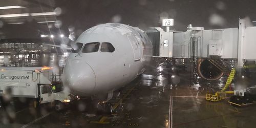 Close-up of airplane at night