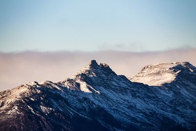 Scenic view of snow covered mountains