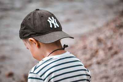 Portrait of young man wearing hat