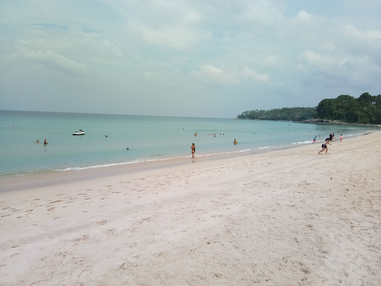 sea, beach, land, water, sky, body of water, sand, holiday, nature, trip, vacation, cloud, scenics - nature, shore, beauty in nature, ocean, travel destinations, travel, horizon over water, tourism, tranquility, horizon, group of people, coast, water's edge, coastline, summer, tranquil scene, day, environment, leisure activity, tourist, outdoors, relaxation, bay, idyllic, tree, wave, seascape, wind wave, shoal, non-urban scene, large group of people, nautical vessel, tropical climate, landscape, adult, lifestyles, blue, island, motion, sports