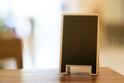 Close-up of laptop on table at home