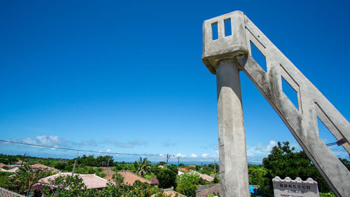 Low angle view of old building against blue sky