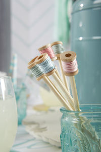 Close-up of glass jar on table