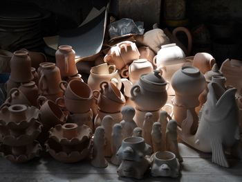 High angle view of various pottery at market