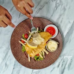 High angle view of man preparing food