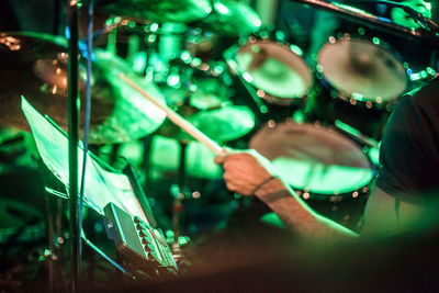 Cropped hand of man playing in music concert