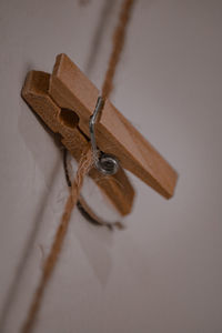 High angle view of rope tied on wooden table