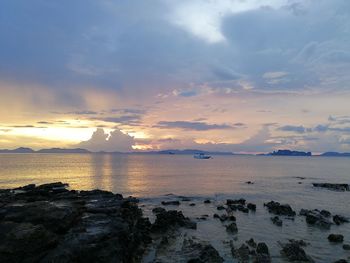 Scenic view of sea against sky at sunset