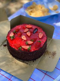 High angle view of cake on cutting board