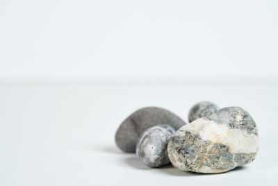 Close-up of coins on white background