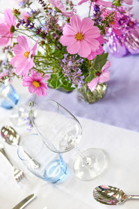 Close up from above of table place setting at formal dinner party