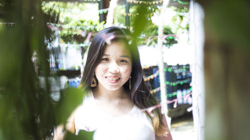 Portrait of smiling young woman