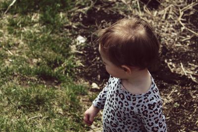 High angle view of cute boy on field