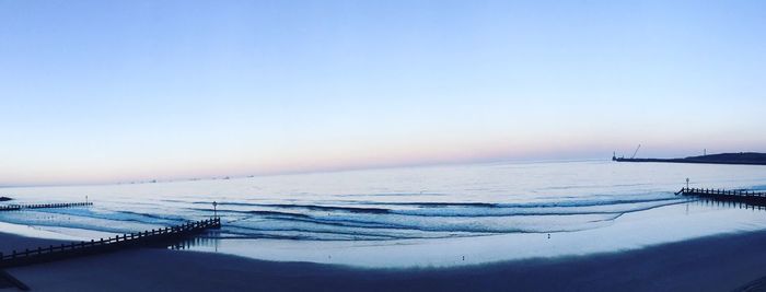 Scenic view of sea against clear sky