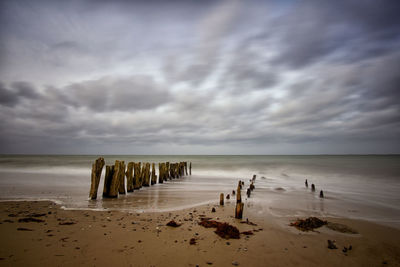 Scenic view of beach against sky