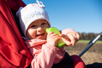 Portrait of cute girl holding ice cream