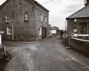 Road leading towards building